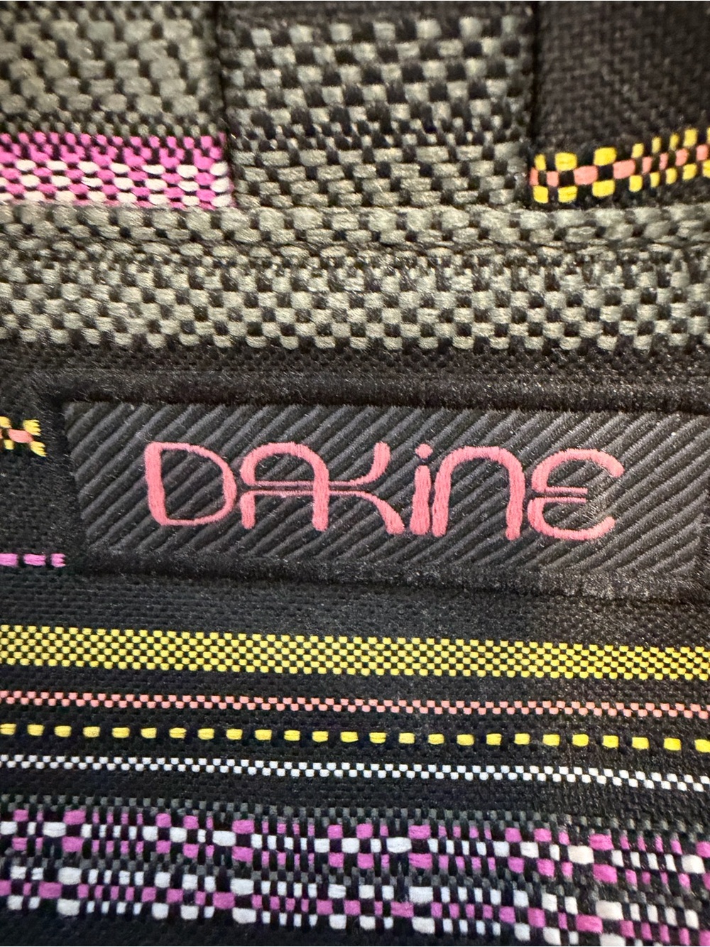 Dakine Black Backpack with Pink and Yellow Accent Pattern